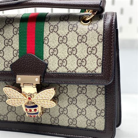 gucci bag bee|Gucci bag with bee clasp.